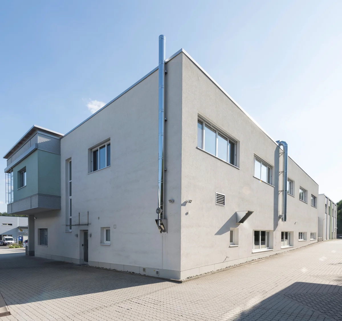 Neubau und Erweiterungsbau von Bürogebäude und Produktionshalle - CLEVER Systemtechnik GmbH